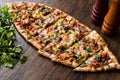 Turkish Pide with meat and vegetables. Royalty Free Stock Photo