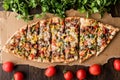 Turkish Pide with meat and vegetables. Royalty Free Stock Photo