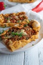 Turkish pide with minced meat, vegetables and cheese Royalty Free Stock Photo