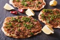 Turkish pizza lahmacun closeup on a stone table. horizontal Royalty Free Stock Photo