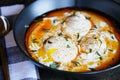 Turkish Poached Eggs or Cilbir with Mint Royalty Free Stock Photo