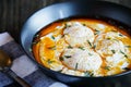Turkish Poached Eggs or Cilbir Garnished with Mint Royalty Free Stock Photo