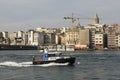Turkish police boat is in motion at entrance of The Golden Horn