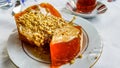 Turkish Pumpkin Dessert with tahini and tea / Tahinli Kabak Tatlisi Royalty Free Stock Photo