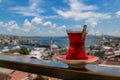 Turkish red hot aromatic tea in traditional authentic glass cup - armudu Royalty Free Stock Photo