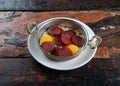 Turkish Sausage sucuk and egg on rustic wooden table