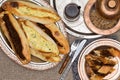 Turkish savory pide served with hot fresh tea