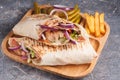 Turkish Shawarma with chicken and vegetables with onions