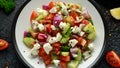 Turkish Shepards Salad with cucumber, tomato, red onion, pepper, parsley and Feta cheese Royalty Free Stock Photo