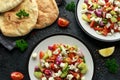 Turkish Shepards Salad with cucumber, tomato, red onion, pepper, parsley pita bread and Feta cheese Royalty Free Stock Photo