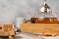 Turkish silver plate with sugar cubes on table