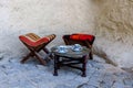 Turkish street cafe in Goreme Open air Museum. Wooden traditional table and chairs on the street. Two cups of turkish coffee. Royalty Free Stock Photo