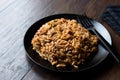 Turkish Style Cooked Orzo Pasta in Black Plate / Pilav or Pilaf.