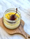 Turkish Style Custard Pudding Dessert with Safflower, Pear, Salep / Sahlep and Poppy Seeds in Jar