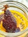 Turkish Style Custard Pudding Dessert with Safflower, Pear, Salep / Sahlep and Poppy Seeds in Jar