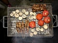 Turkish Style Lamb Kebab Shish Skewer Cooked with Mushrooms and Roasted Tomatoes on Street Barbecue Mangal Royalty Free Stock Photo