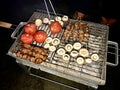 Turkish Style Lamb Kebab Shish Skewer Cooked with Mushrooms and Roasted Tomatoes on Street Barbecue Mangal Royalty Free Stock Photo