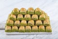 Turkish sweet Dry Baklava on a marble background. Turkish pastry dessert baklava. Ramadan or holiday desserts concept. Antep