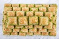 Turkish sweet Dry Baklava on a marble background. Turkish pastry dessert baklava. Ramadan or holiday desserts concept. Antep