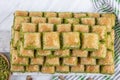 Turkish sweet Dry Baklava on a marble background. Turkish pastry dessert baklava. Ramadan or holiday desserts concept. Antep Royalty Free Stock Photo