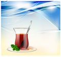 Turkish tea cup with black tea, silver spoon and mint on blue waves background. Tea illustration for advertising Royalty Free Stock Photo