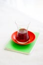 Turkish Tea Glass On The Small Notebook Royalty Free Stock Photo