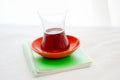 Turkish Tea Glass On The Small Notebook Royalty Free Stock Photo