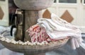 Turkish traditional hammam cotton towels in the interior ancient bathroom with marble fountain