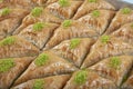 Turkish traditional Pistachio Baklava dessert, baklava on tray. Food pastry shop background