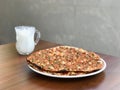Turkish Traditional Pizza Lahmacun with Minced or Lamb Meat served with Ayran Buttermilk.