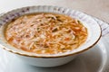 Turkish Traditional Vermicelli Soup in a wooden bowl / Tel sehriye corbasi. Royalty Free Stock Photo