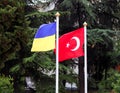 Turkish and ukrainian flags on flagpole