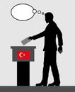 Turkish voter male voting for election in Turkey with thought bu