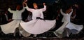 The Turkish whirling dancers or Sufi whirling dancers at Spirito Del Pianeta Royalty Free Stock Photo