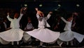 The Turkish whirling dancers or Sufi whirling dancers at Spirito Del Pianeta Royalty Free Stock Photo