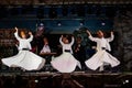 The Turkish whirling dancers or Sufi whirling dancers at Spirito Del Pianeta Royalty Free Stock Photo