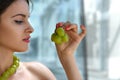 Turkish woman made decorations from the living grapes. Royalty Free Stock Photo