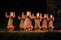 Turkish women dancing with wooden spoons at folklore festival stage