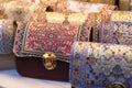 Turkish women`s bags in the shop showcase. Rich traditional ornament. Popular souvenir from Turkey, Istanbul 2019-08-11