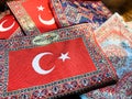 Turkiye is Turkish for the country Turkey. A typical carpet souvenir with the Turkish flag on it to take home from vacation.