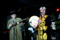 Turkmen folk music group Turkmenistan national Oriental mens costumes playing folk music on folk instruments.