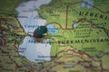 Turkmenbasy pinned on a map with the flag of Turkmenistan Royalty Free Stock Photo