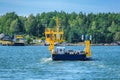 Yellow cable ferry carrying summer habitants and tourists to archipelago from Nauvo to Korppoo island, Finland