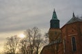 Turku Cathedral behind trees on a sunset Royalty Free Stock Photo