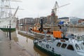 Turku, Finland - April 29 2018: Ships and boats at the port of city Turku with shipyard cranes and construction at