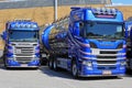 Two Blue Scania R Series Tank Trucks