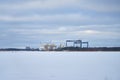 TURKU, FINLAND - 13.02.2021: Shipbuilding shipyard Meyer, Turku on the sea coast covered with ice Royalty Free Stock Photo