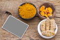 Turmeric in bowl on table, top view Royalty Free Stock Photo