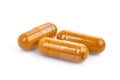 Turmeric capsules isolated on white Royalty Free Stock Photo