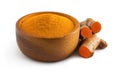 Turmeric curcumin powder in a wooden bowl  and rhizomes  isolated on a white background,herbal Royalty Free Stock Photo